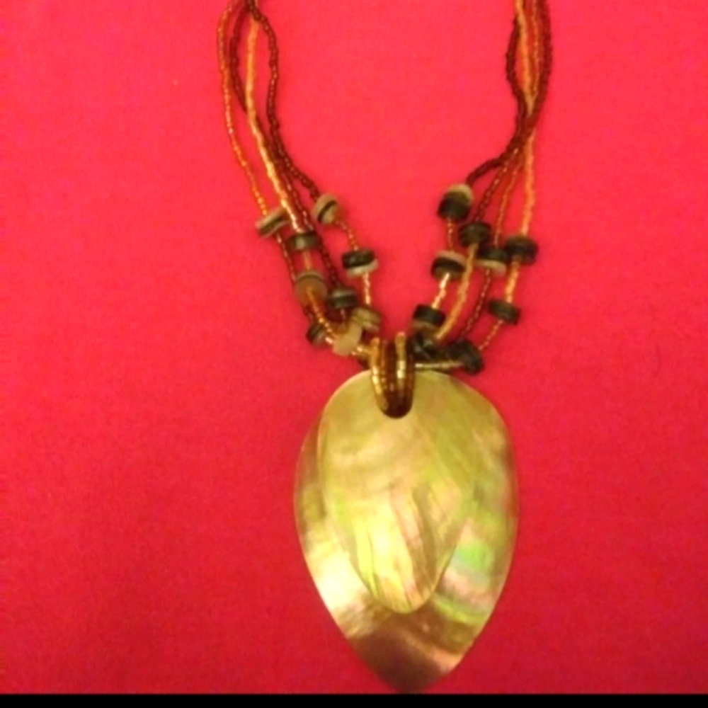 J388 Goldtone Shell Statement